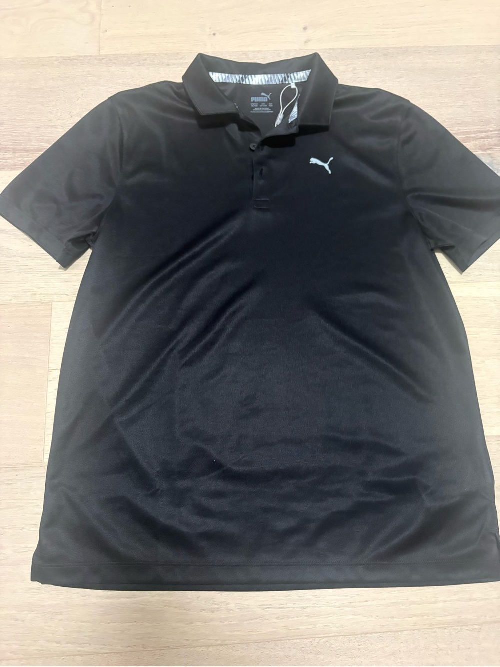 Puma black short-sleeve golf/athletic polo